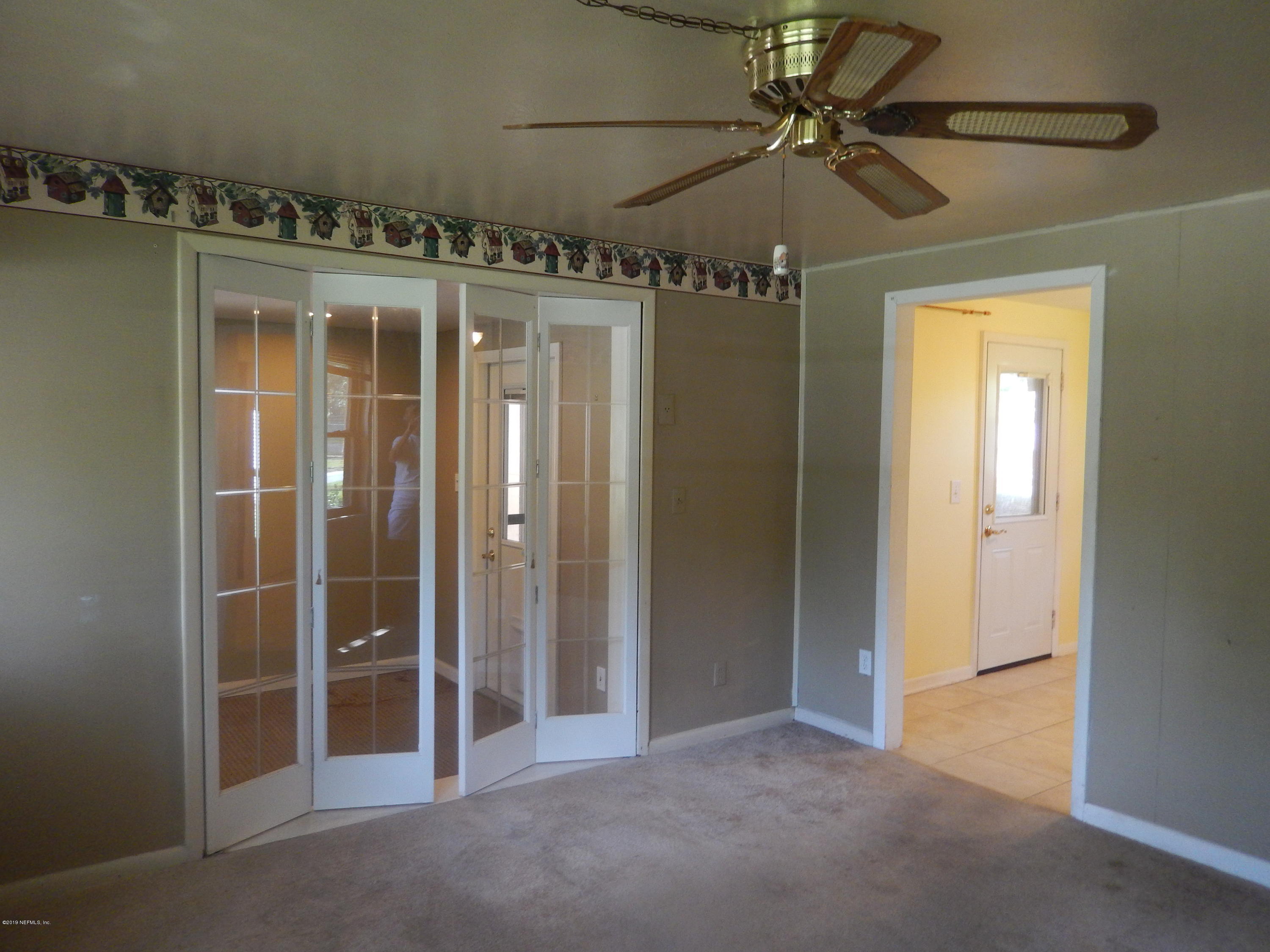 6907 Tampico Road South Jacksonville, FL 32244 - Photo 8 of 55 glass bi-fold doors in family room
