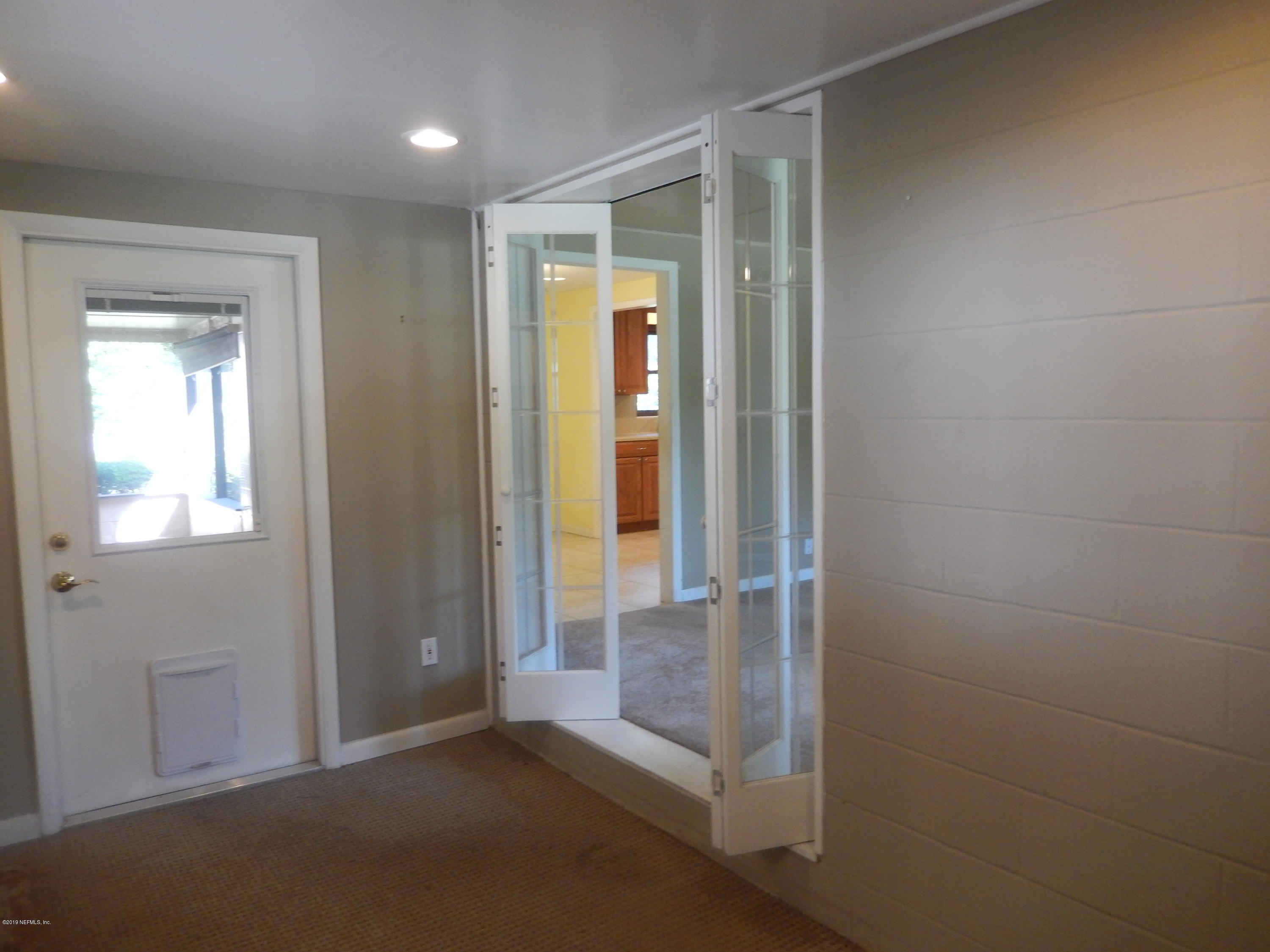 6907 Tampico Road South Jacksonville, FL 32244 - Photo 10 of 55 family room door opens to screen porch