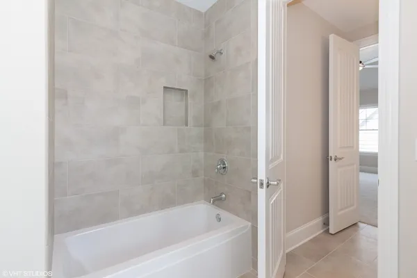 a bathroom with a bathtub