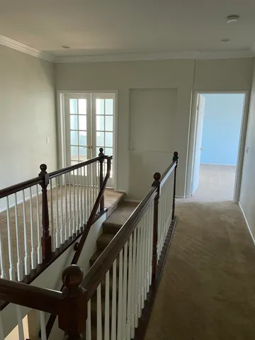 a view of a hallway with window