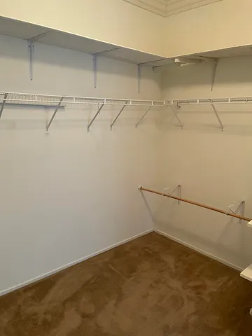 a view of a room with racks on the wall