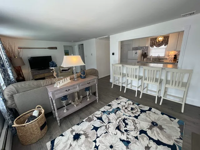 a bedroom with furniture and a baby crib