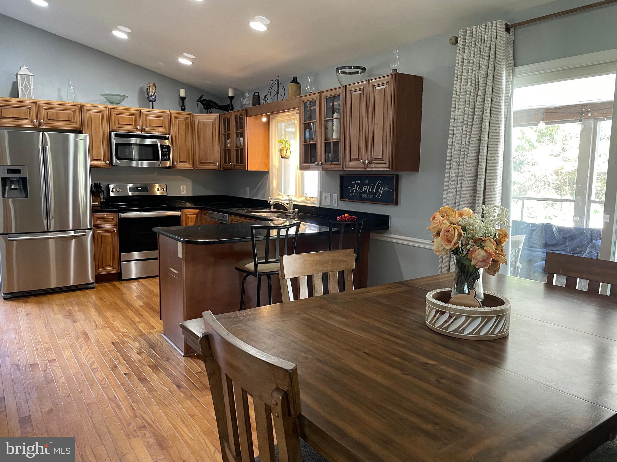 11498 Reed Circle Ridgely, MD 21660 - Photo 5 of 21 Great kitchen with granite, hardwoods and stainles