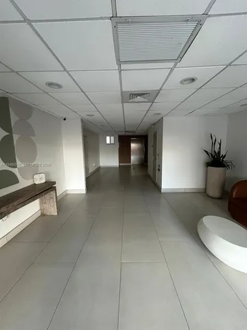 a view of a room with shelves