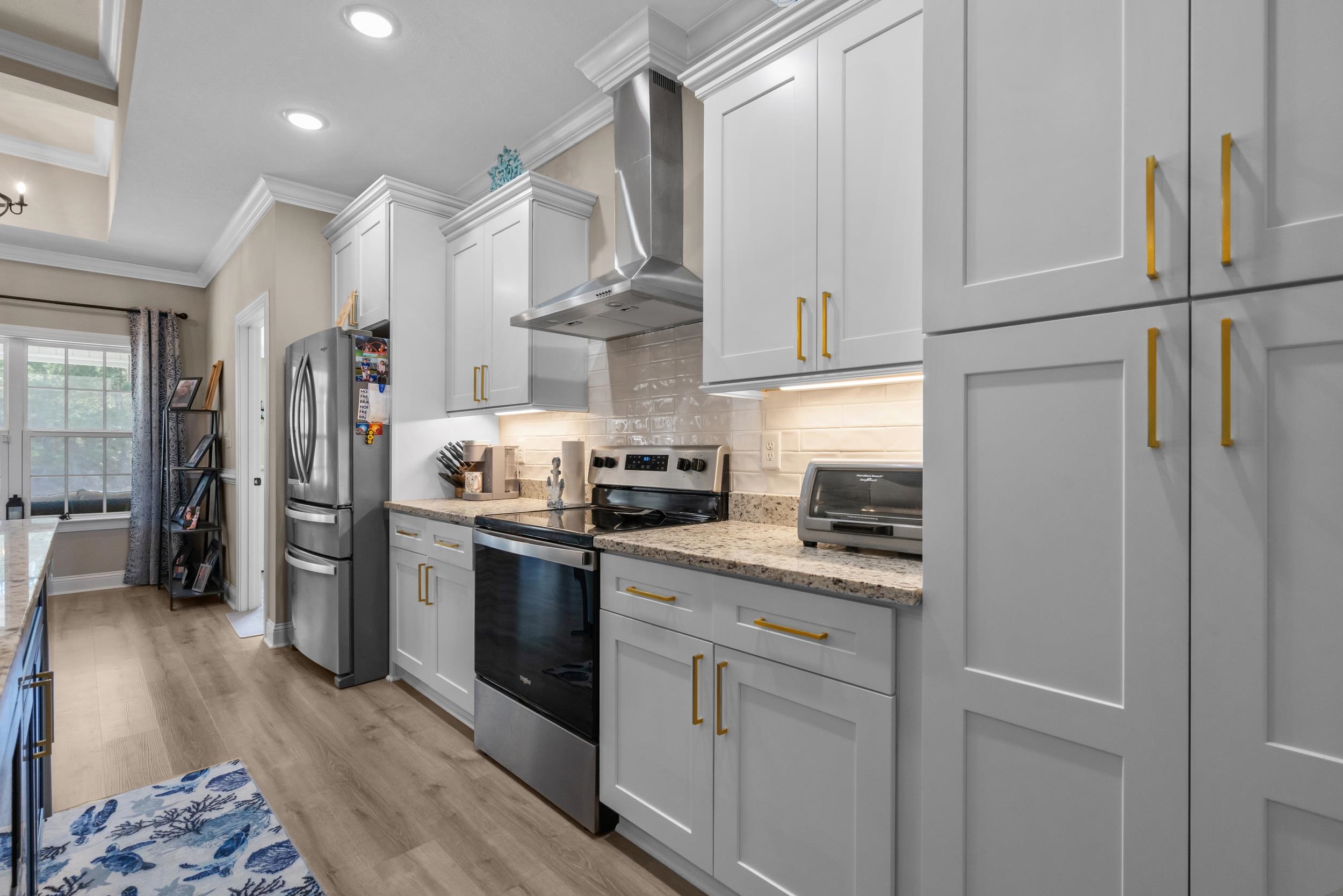 1061 Busy Corner Road Conway, SC 29527 - Photo 37 of 37 Kitchen featuring stainless steel appliances, light stone countertops, pendant lighting, open floor plan, and recessed lighting