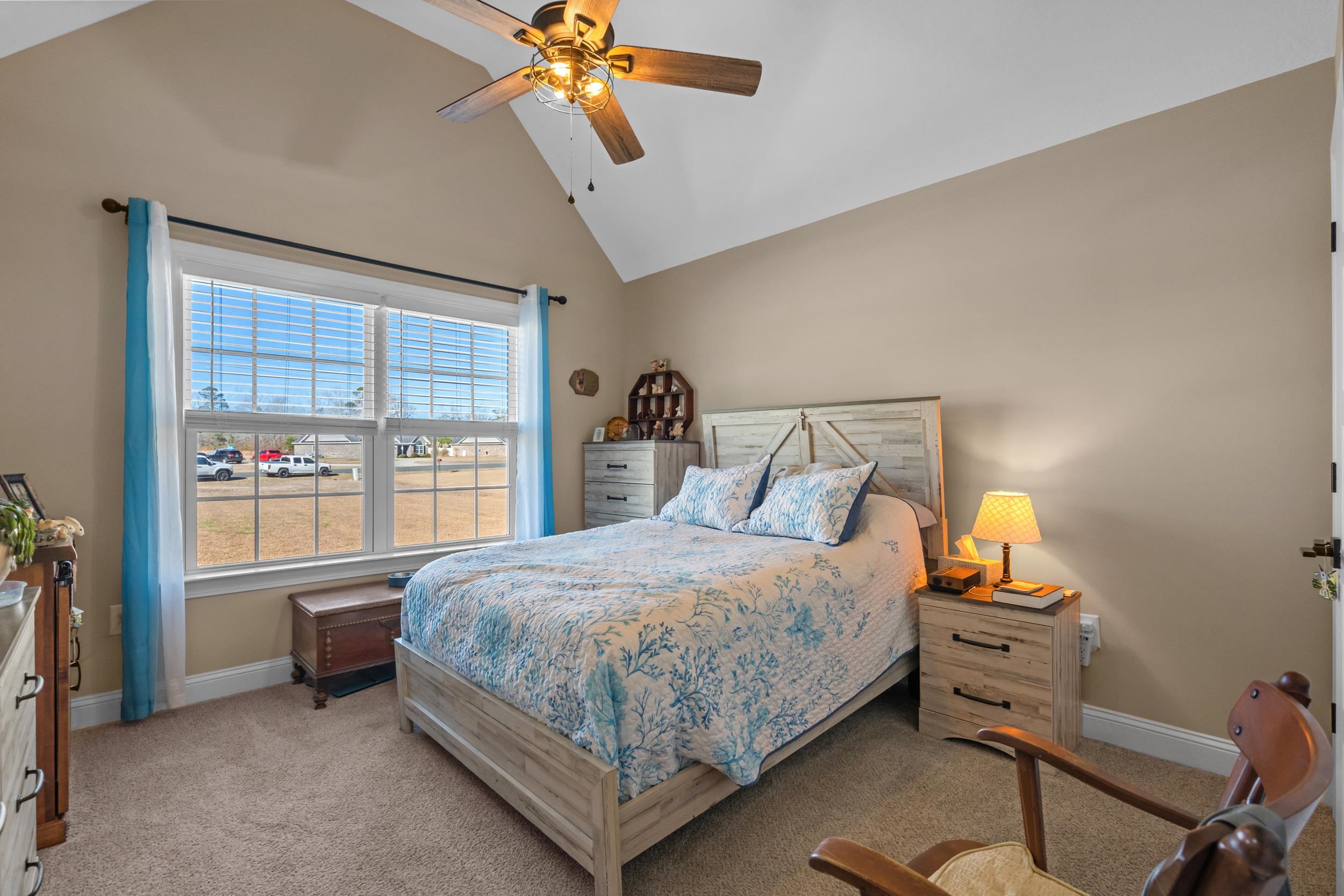 1061 Busy Corner Road Conway, SC 29527 - Photo 20 of 37 Bedroom with crown molding, a ceiling fan, light carpet, and a tray ceiling