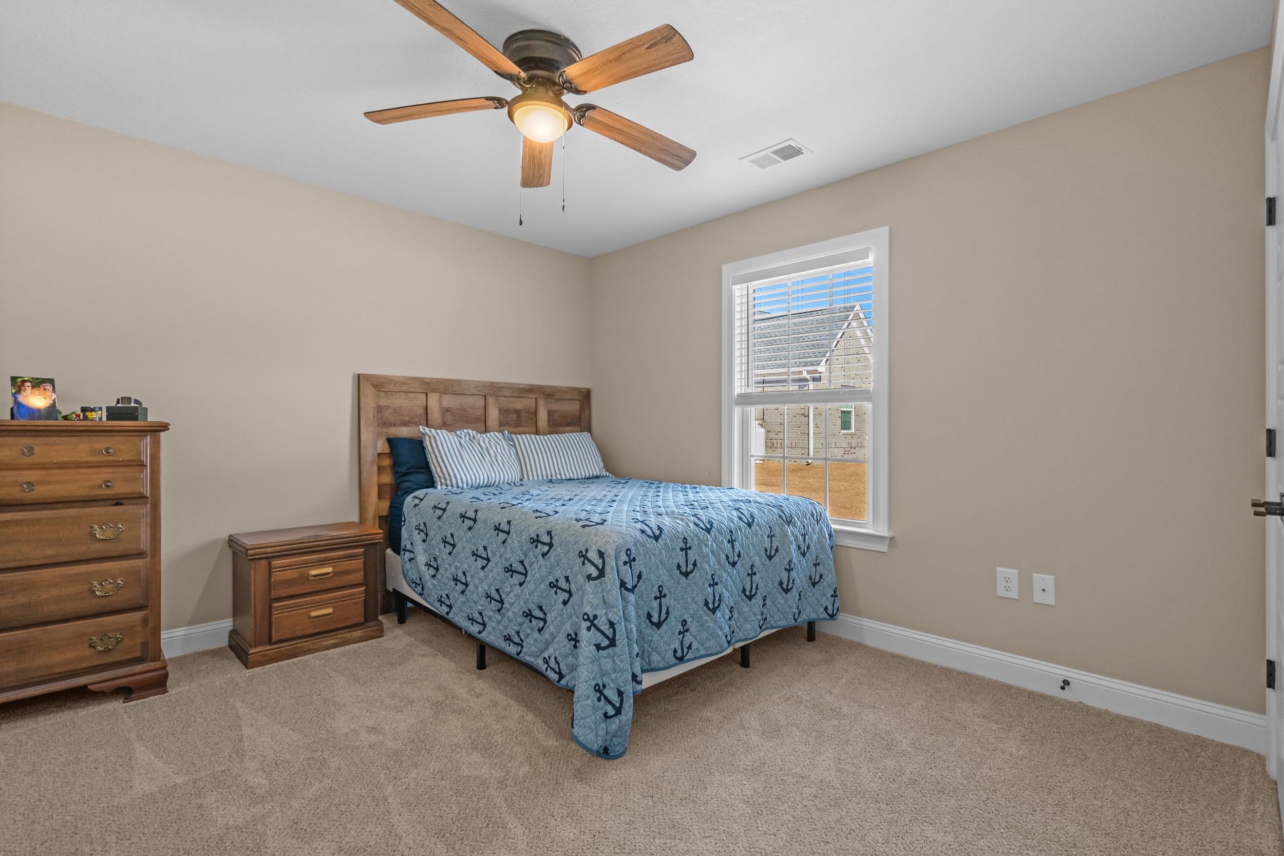 1061 Busy Corner Road Conway, SC 29527 - Photo 25 of 37 Bathroom with light wood-style floors, a stall shower, a garden tub, connected bathroom, and ornamental molding