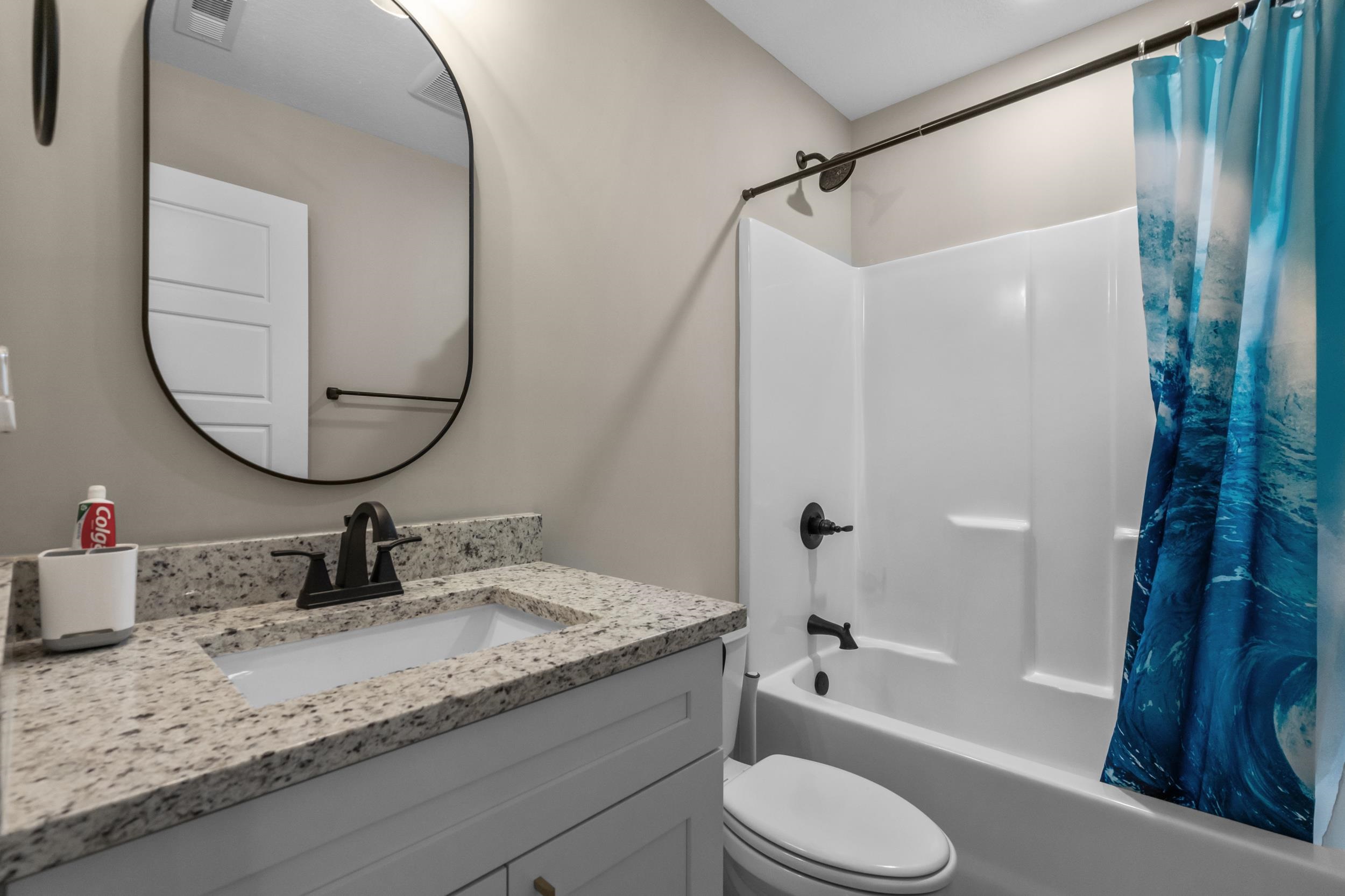 1061 Busy Corner Road Conway, SC 29527 - Photo 27 of 37 Carpeted bedroom featuring a ceiling fan and baseboards
