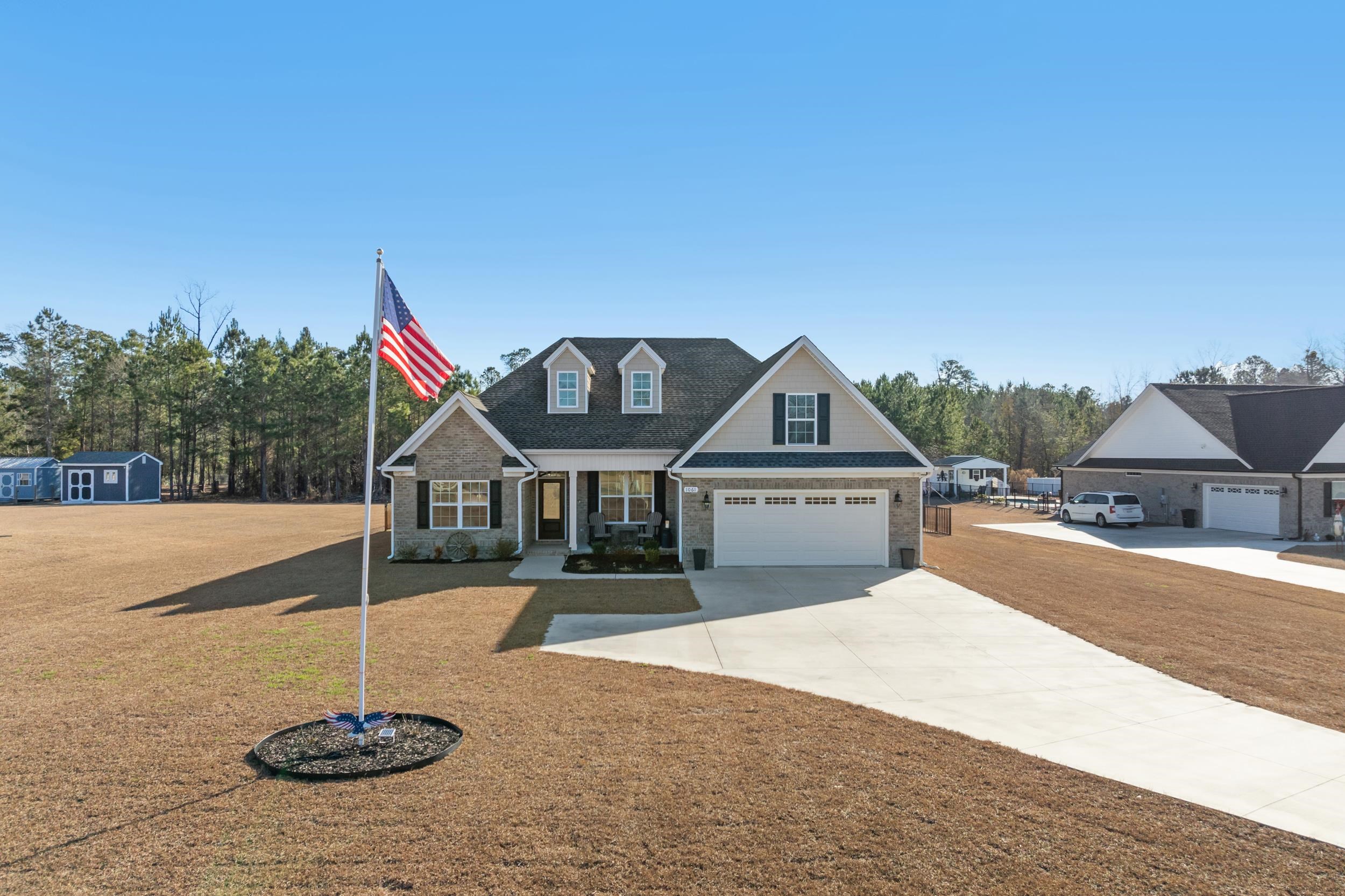 1061 Busy Corner Road Conway, SC 29527 - Photo 35 of 37 View of pool featuring a fenced backyard, a sunroom, and a patio