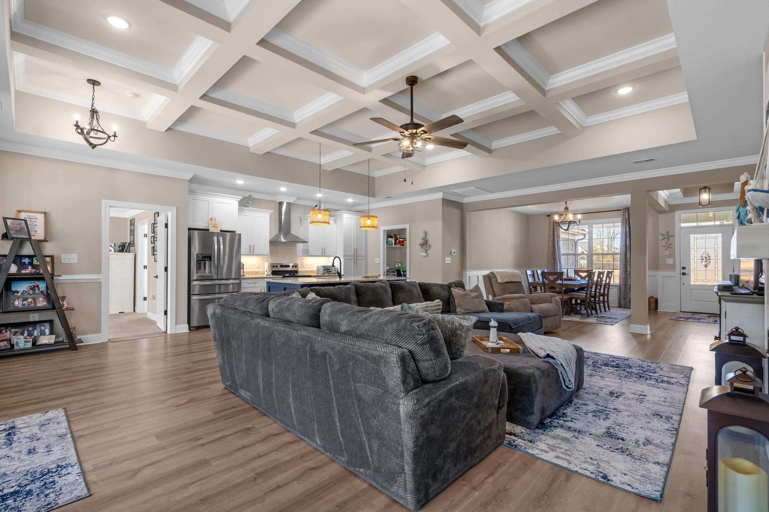 1061 Busy Corner Road Conway, SC 29527 - Photo 8 of 37 Living room with a chandelier, light wood finished floors, a ceiling fan, recessed lighting, and ornamental molding