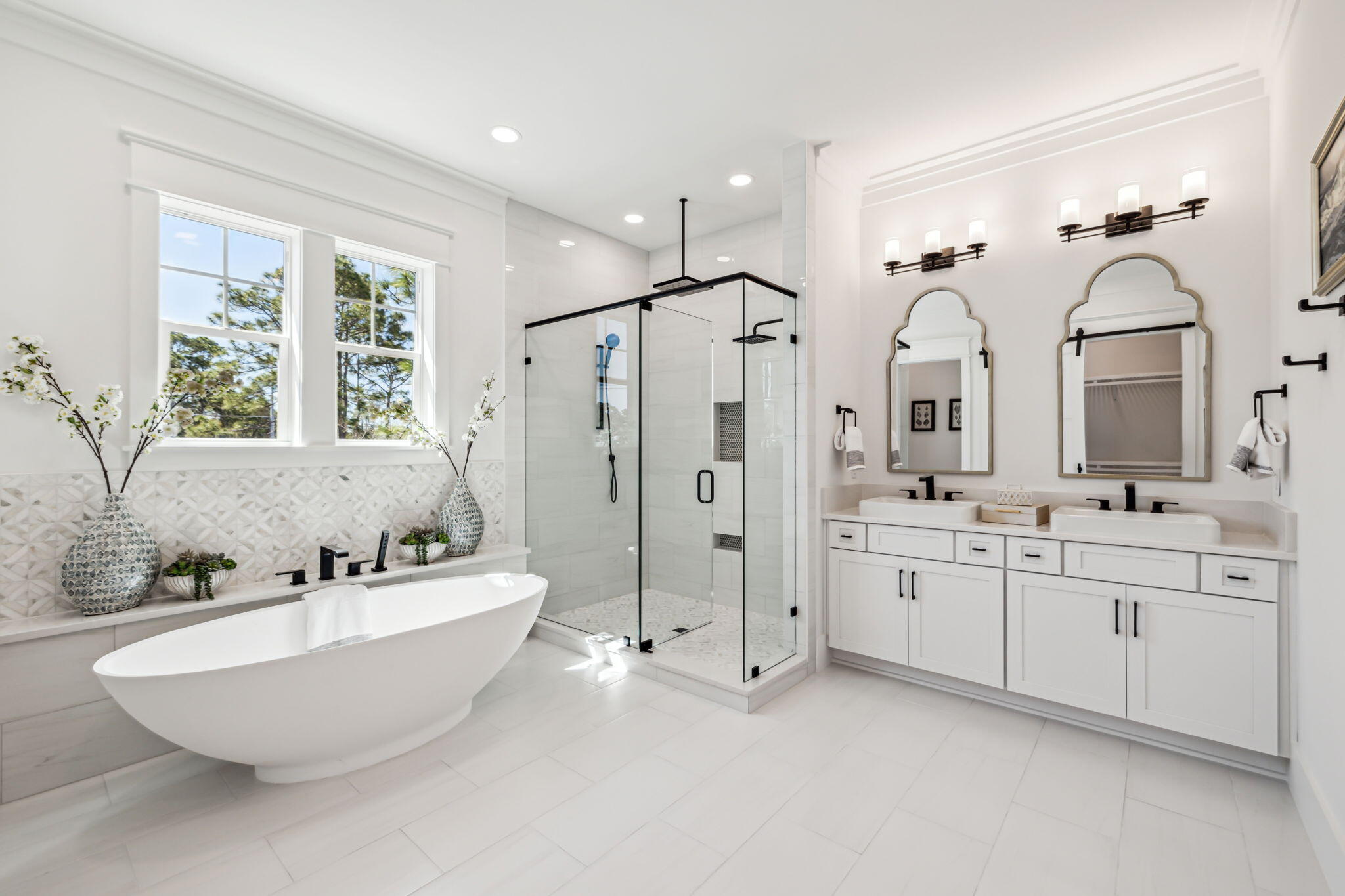 33 Grayton Boulevard Santa Rosa Beach, FL 32459 - Photo 24 of 48 a spacious bathroom with double vanity a mirror a bathtub and a shower