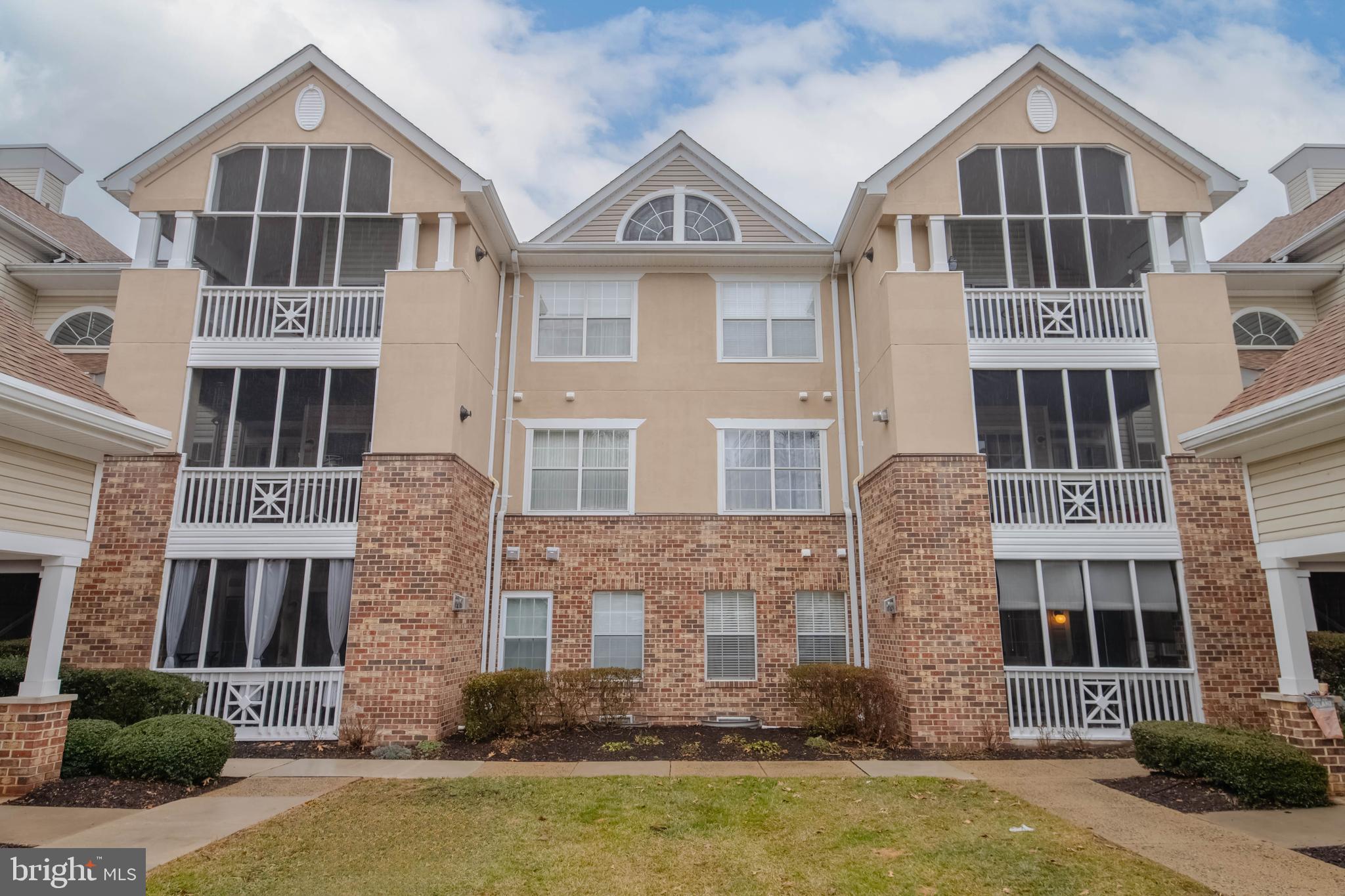 302 Canterbury Road, Unit 302E Bel Air, MD 21014 - Photo 27 of 39 a front view of a house with a yard