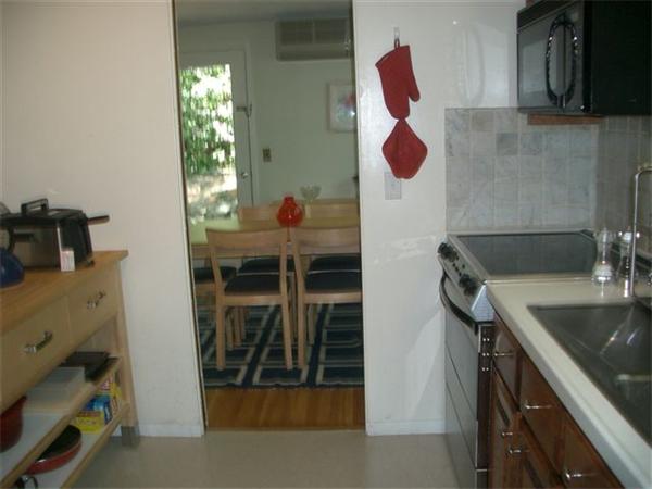8 Mason Street Lexington, MA 02421 - Photo 10 of 14 a kitchen with a sink and a stove
