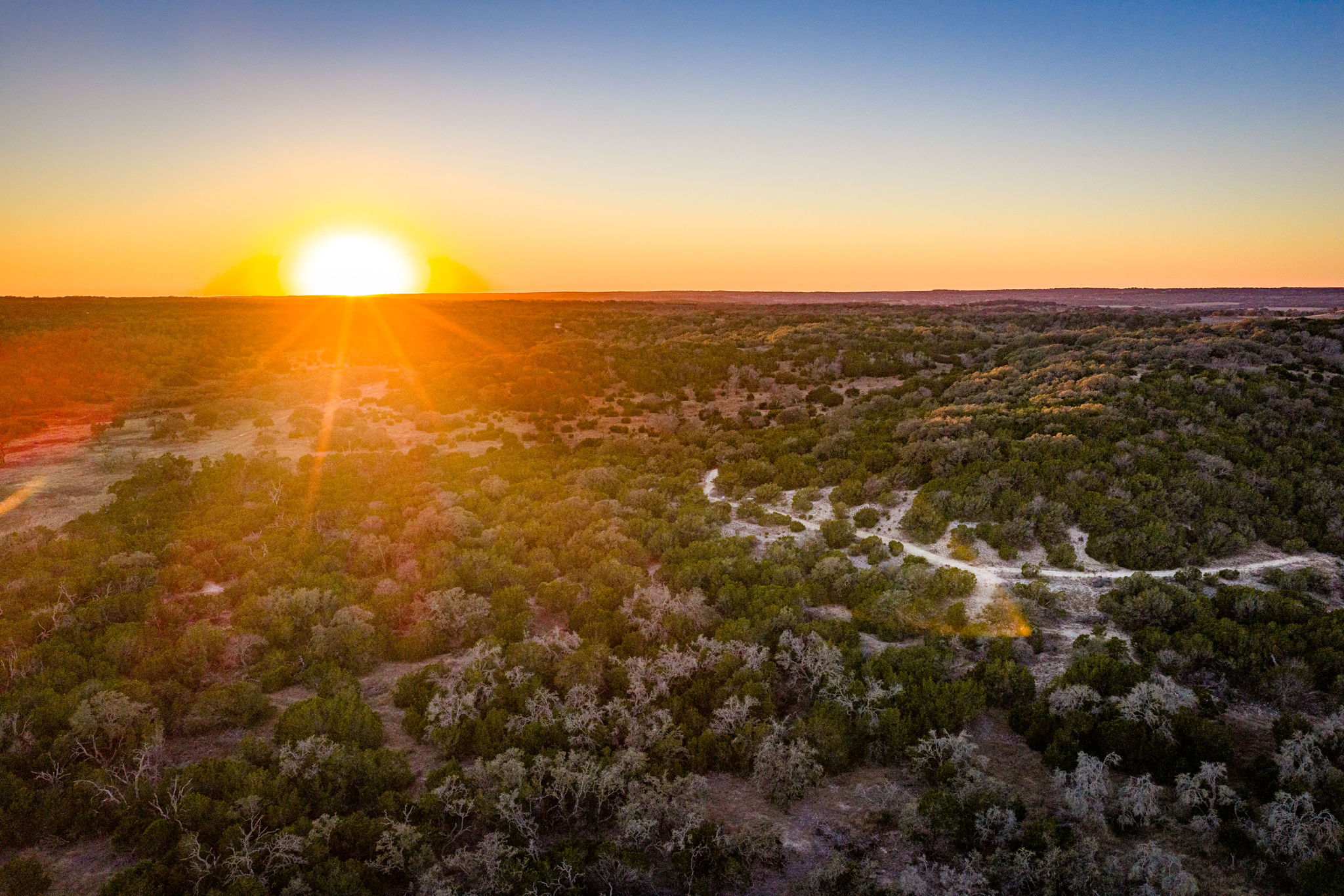 Tbd Steitle Road Fredericksburg, TX 78624 - Photo 20 of 25 an aerial view of residential houses with outdoor space