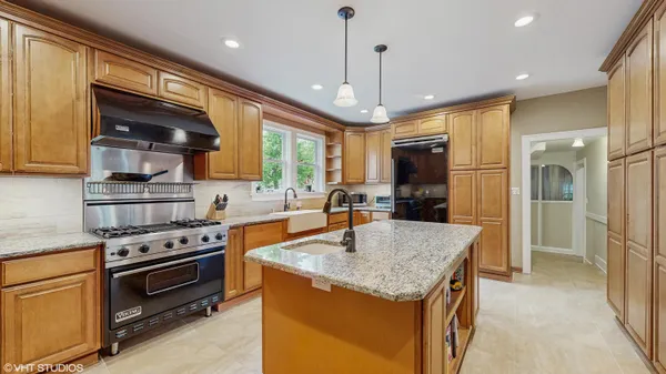 a view of a dining room with furniture water view and a large window