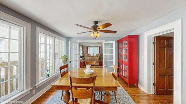 a bed room with a bed and a chair