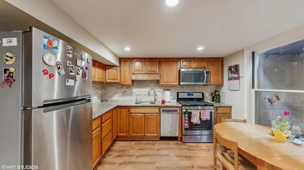 a bathroom with a shower and a bath tub