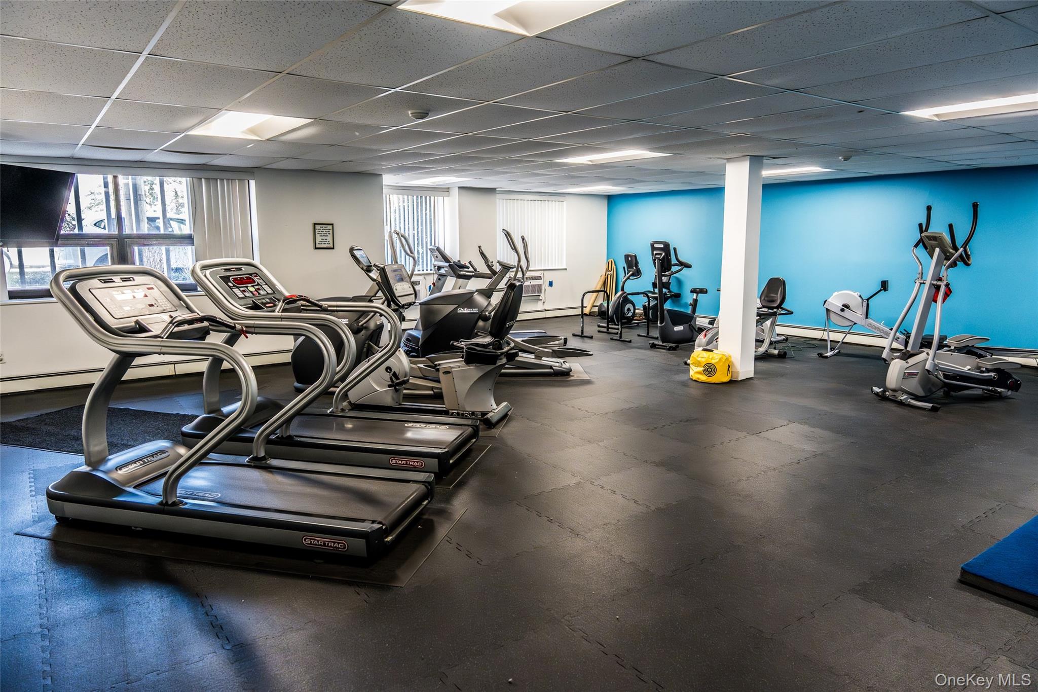 650 Shore Road, Unit 1C Long Beach, NY 11561 - Photo 21 of 21 a view of a room with gym equipment