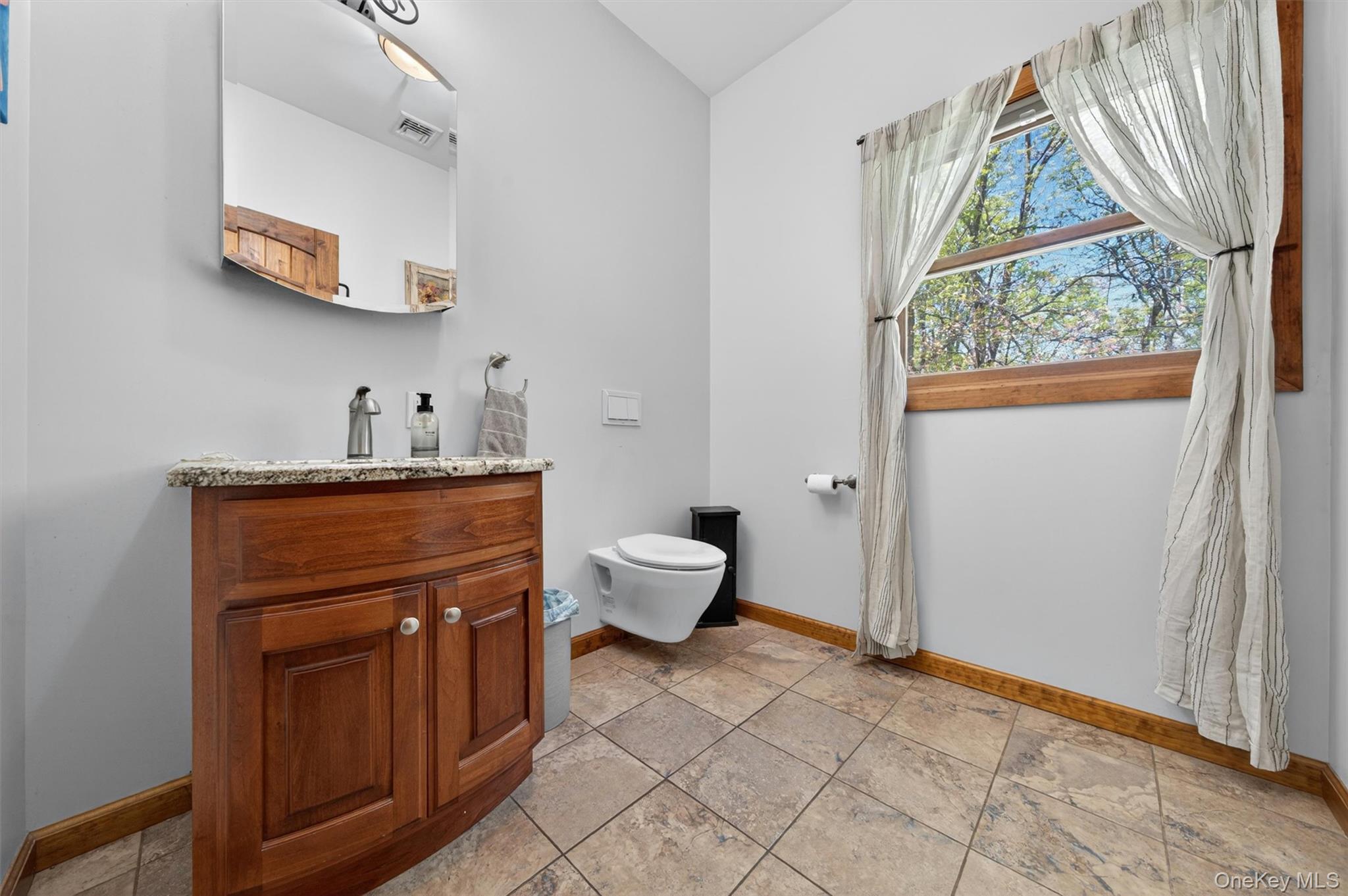 2 White Horse Road Middletown, NY 10940 - Photo 19 of 47 The half bath and mudroom (pictured next) complete the main floor.
