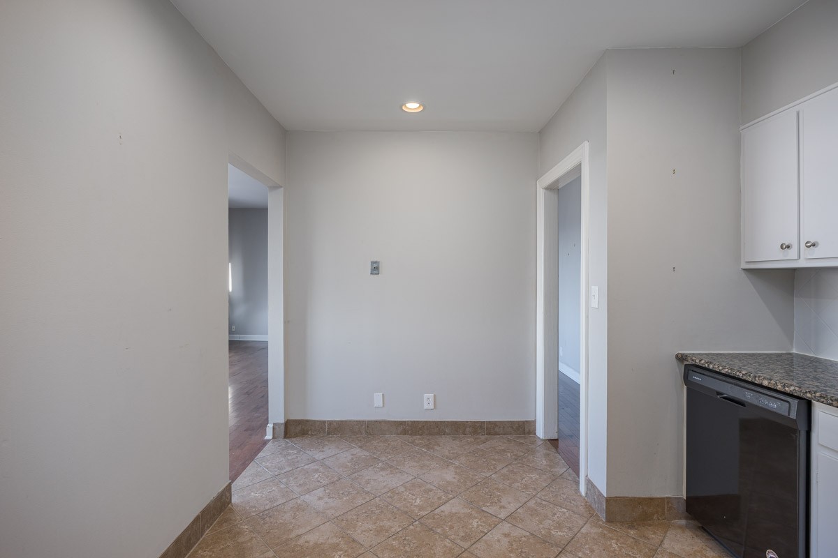 4215 Harding Pike, Unit 1203 Nashville, TN 37205 - Photo 21 of 43 a view of a kitchen cabinets and empty room
