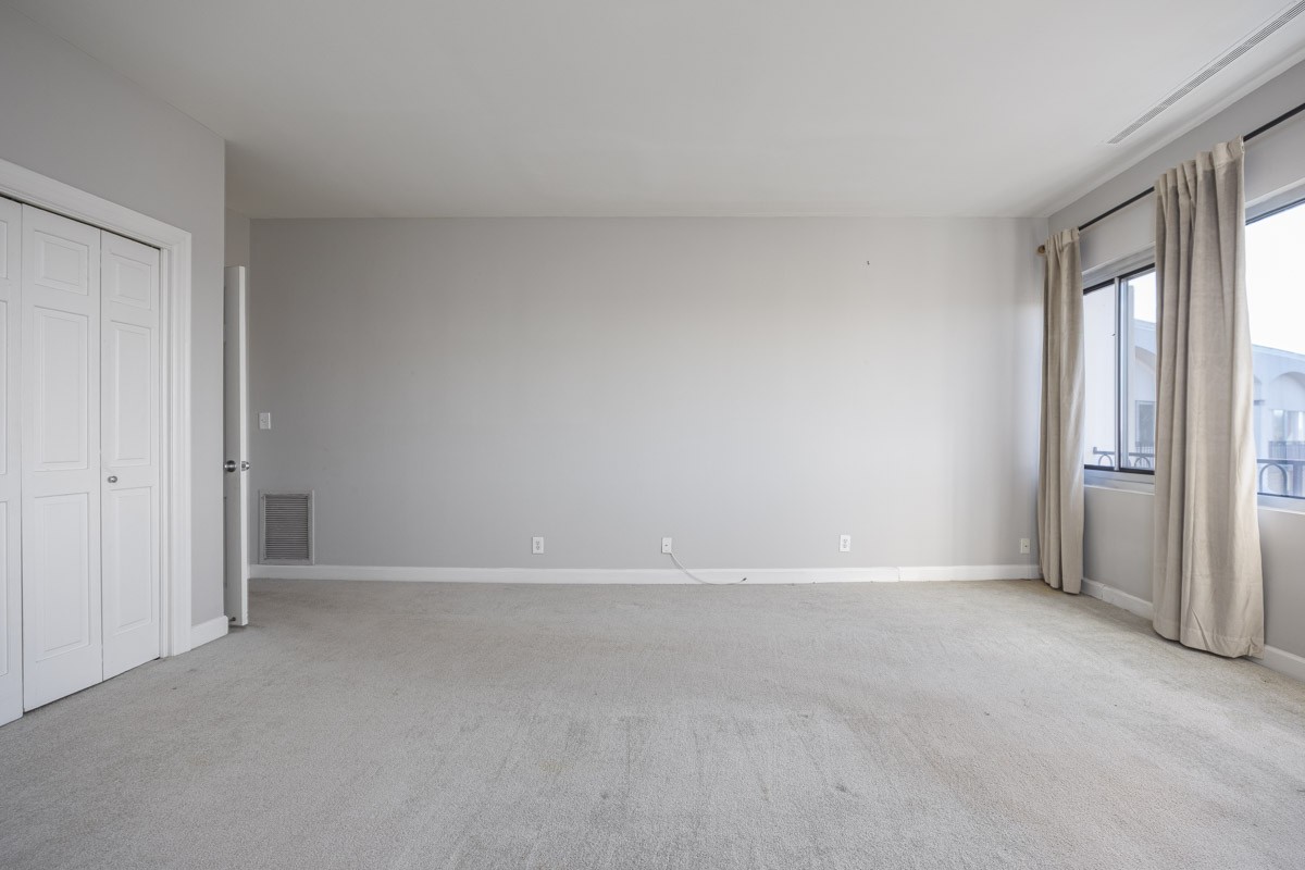 4215 Harding Pike, Unit 1203 Nashville, TN 37205 - Photo 31 of 43 a view of an empty room with a window