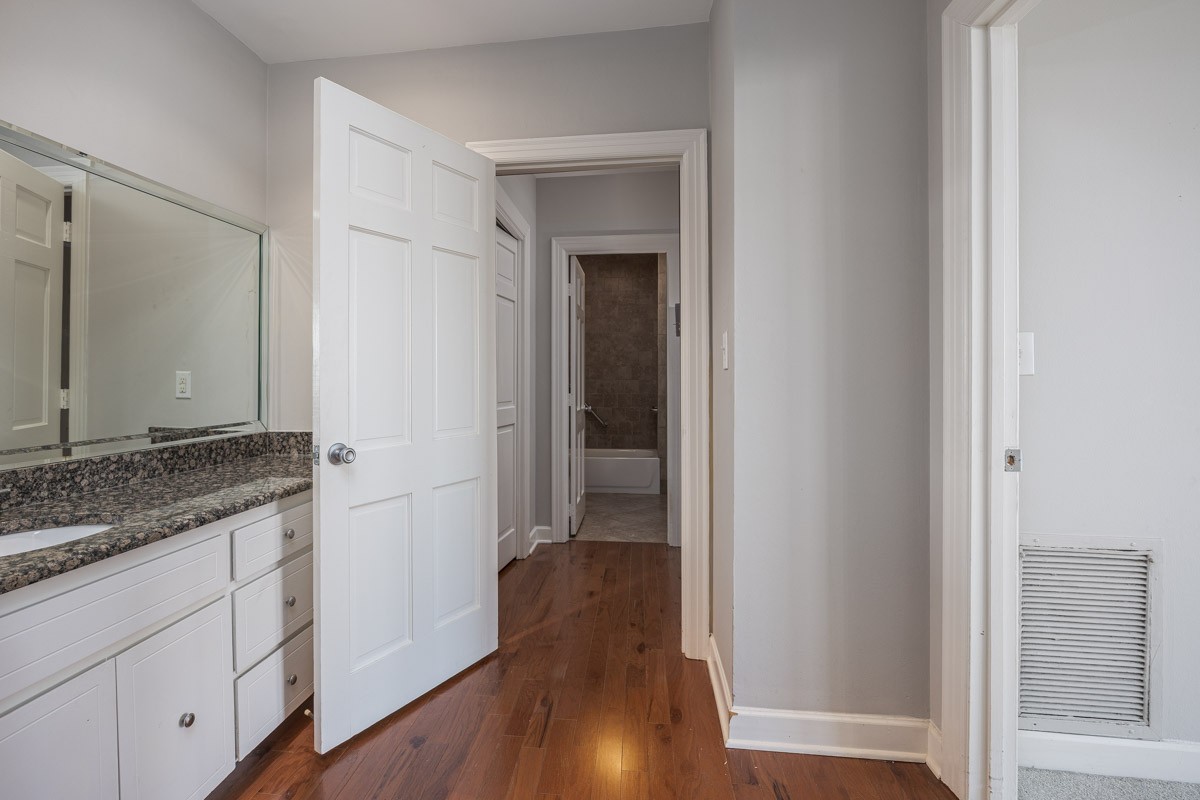 4215 Harding Pike, Unit 1203 Nashville, TN 37205 - Photo 36 of 43 a view of hallway with wooden floor