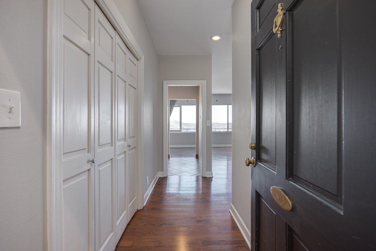 4215 Harding Pike, Unit 1203 Nashville, TN 37205 - Photo 10 of 43 a view of a bathroom from the hallway