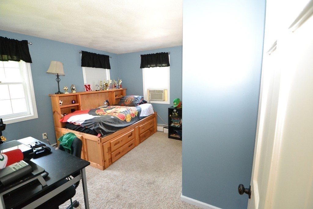 395 Mendon Road North Attleboro, MA 02760 - Photo 11 of 14 a bedroom with furniture and a window
