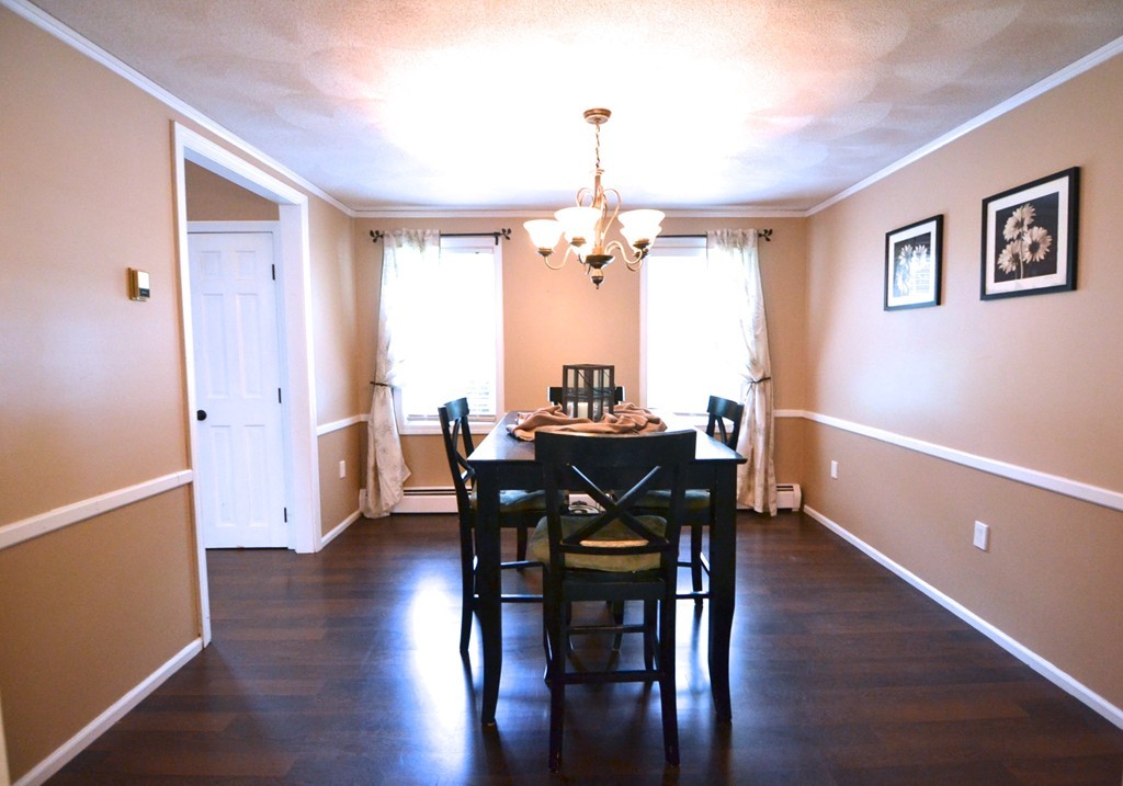 395 Mendon Road North Attleboro, MA 02760 - Photo 6 of 14 a view of a dining room with furniture window and wooden floor