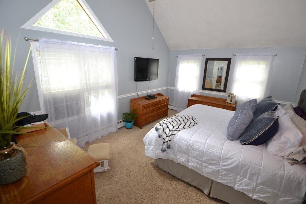 395 Mendon Road North Attleboro, MA 02760 - Photo 9 of 14 a bedroom with a bed and wooden floor