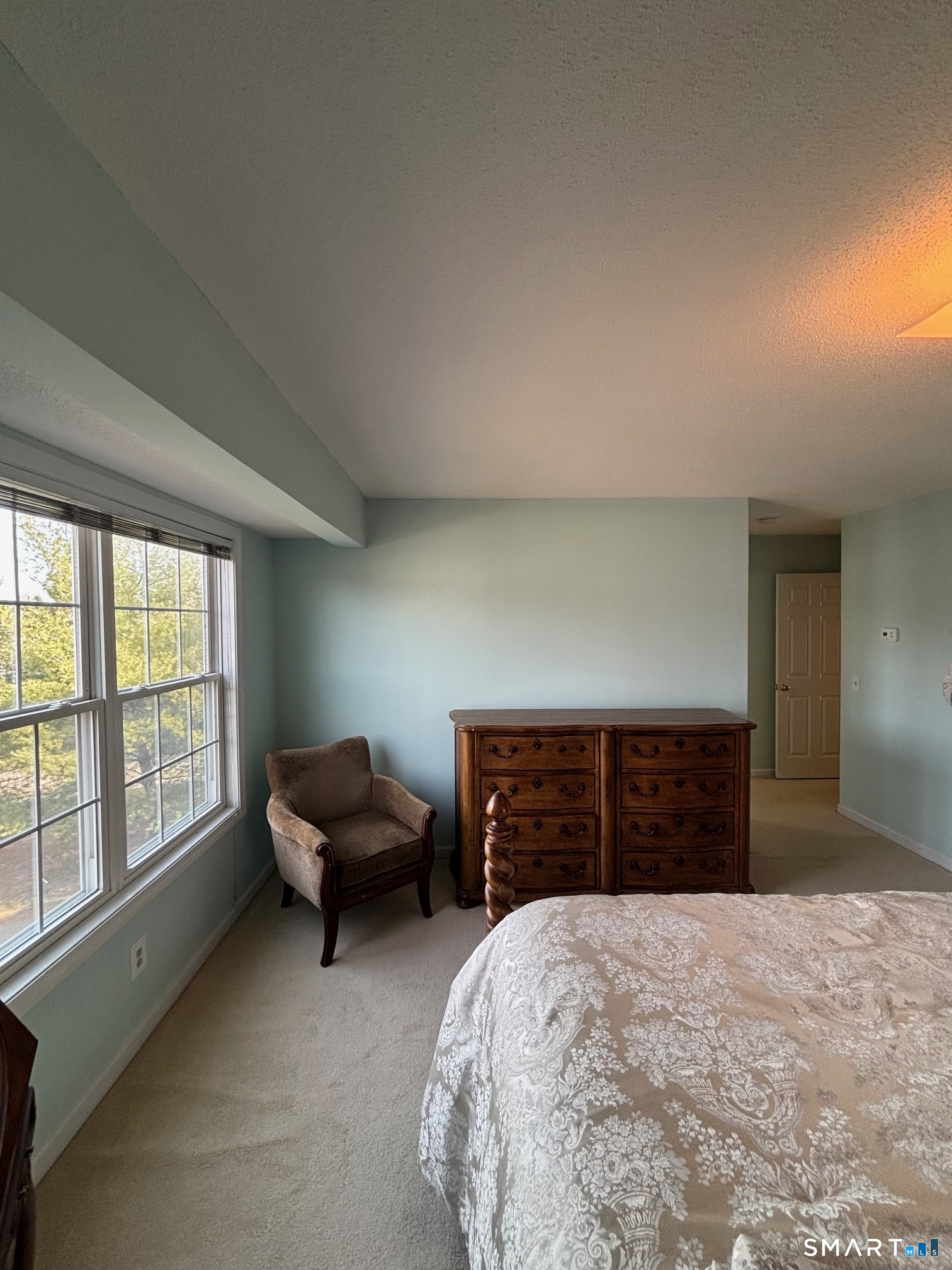 83 Danny's Way, Unit 83 Wallingford, CT 06492 - Photo 25 of 38 a bedroom with a bed and window