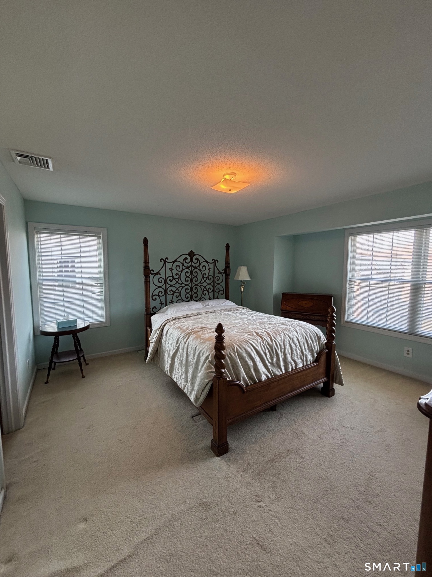 83 Danny's Way, Unit 83 Wallingford, CT 06492 - Photo 26 of 38 a bedroom with a bed and a window