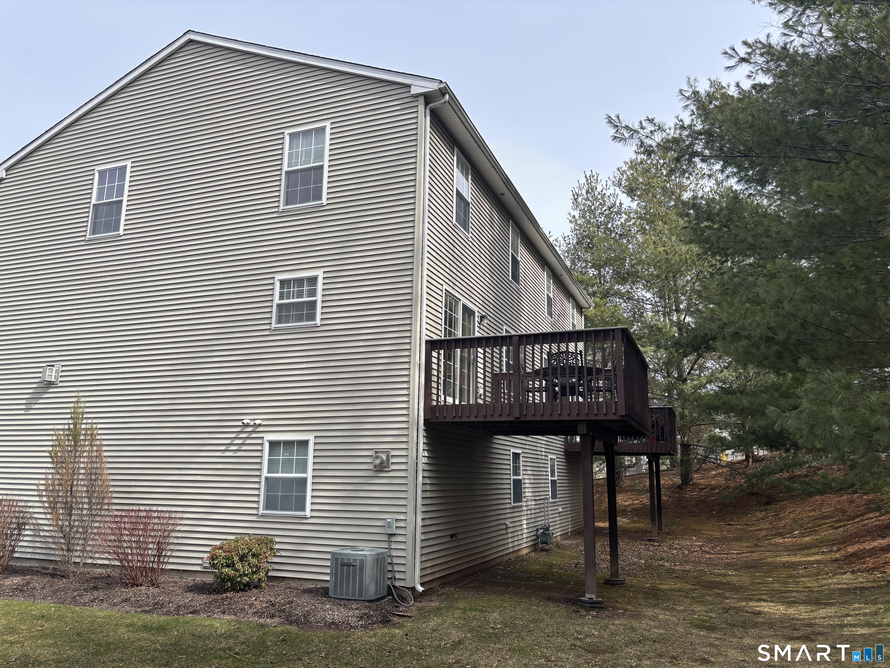 83 Danny's Way, Unit 83 Wallingford, CT 06492 - Photo 34 of 38 a view of a house with a garage