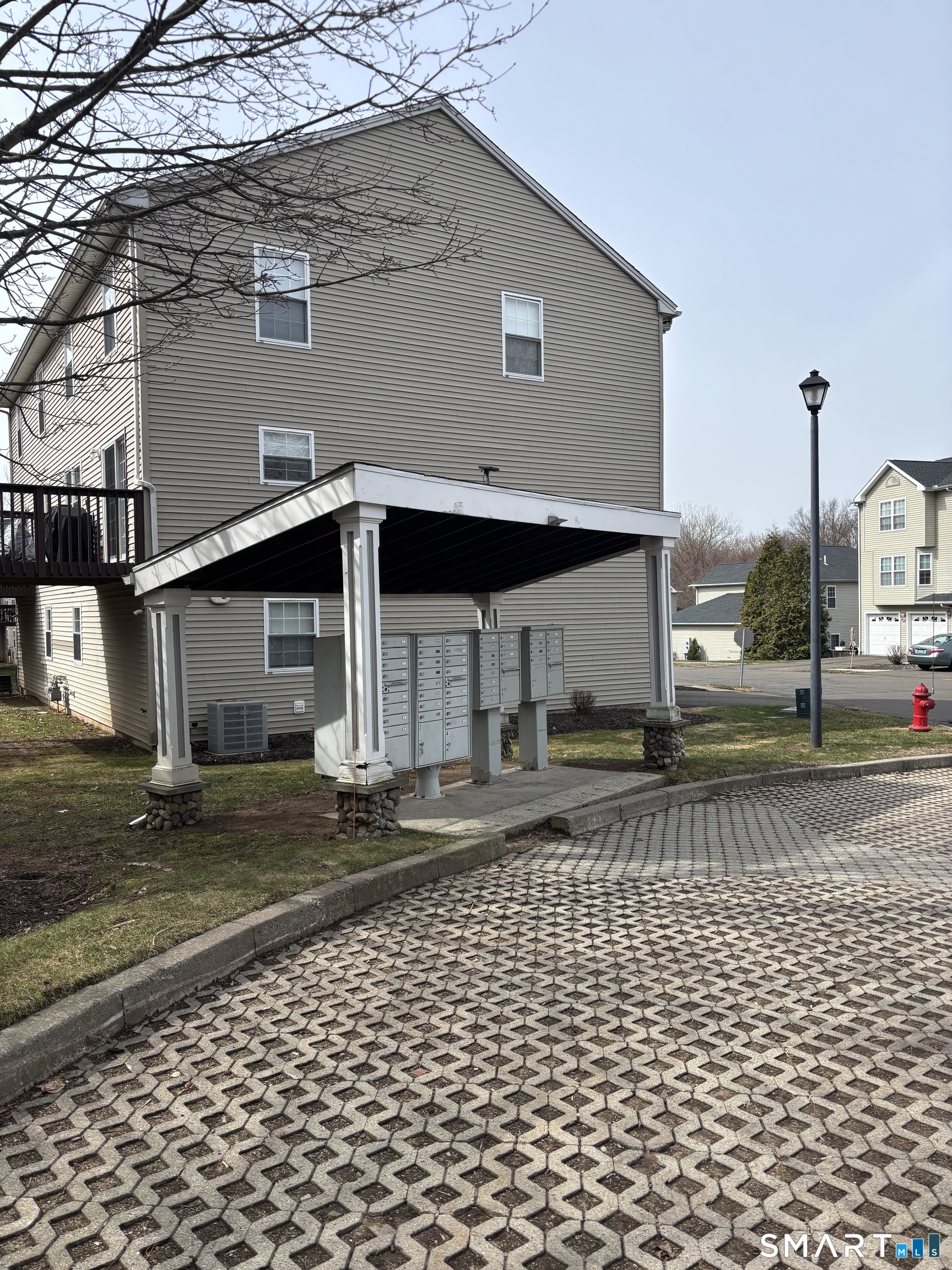 83 Danny's Way, Unit 83 Wallingford, CT 06492 - Photo 35 of 38 a view of a house with a street