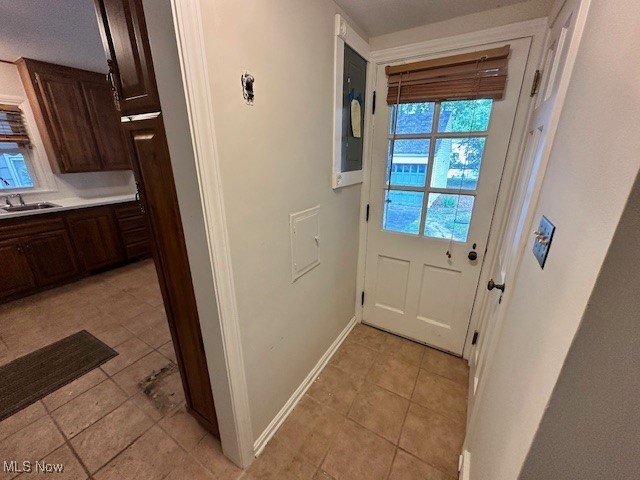 4065 Conover Road Cleveland, OH 44118 - Photo 11 of 24 Doorway featuring sink and light tile patterned floors