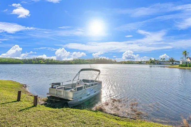 a view of a lake in front of a house