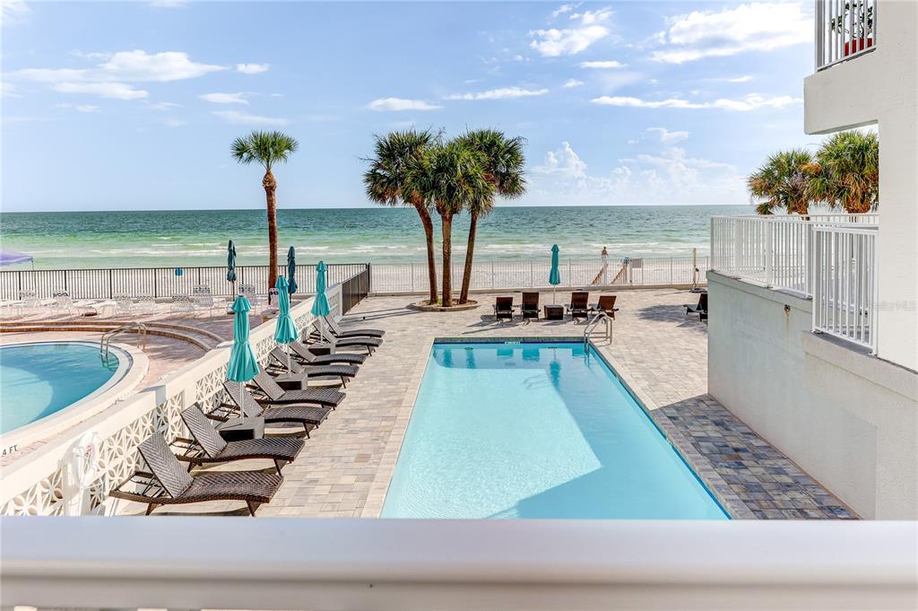 16332 Gulf Boulevard, Unit 1C Redington Beach, FL 33708 - Photo 12 of 90 a view of swimming pool with outdoor seating