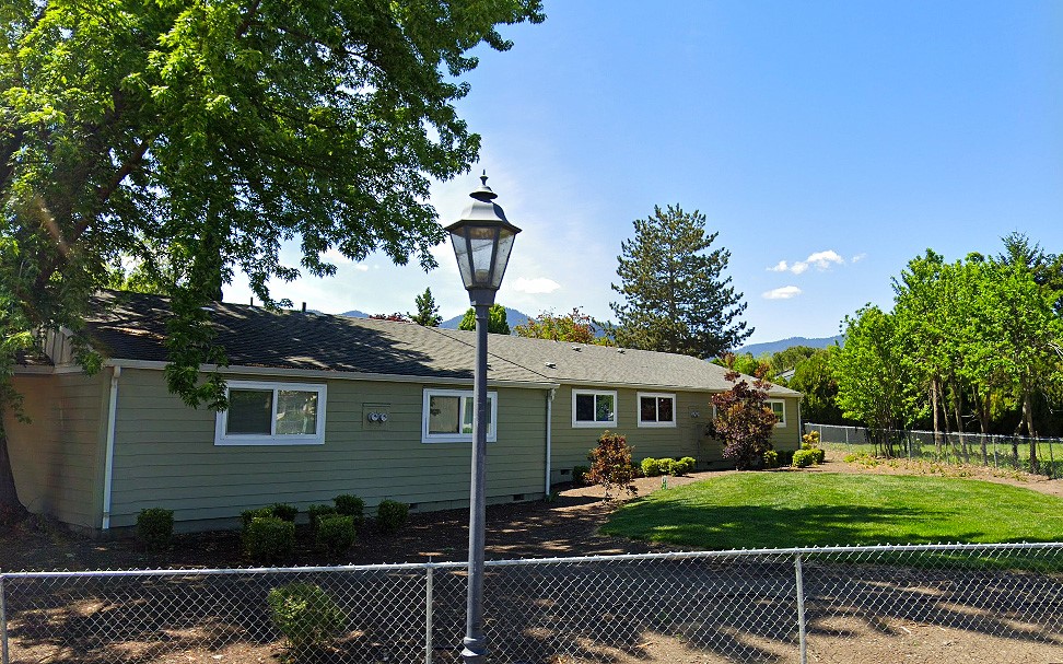 233 Eva Way Talent, OR 97540 - Photo 6 of 7 a front view of a house with a garden
