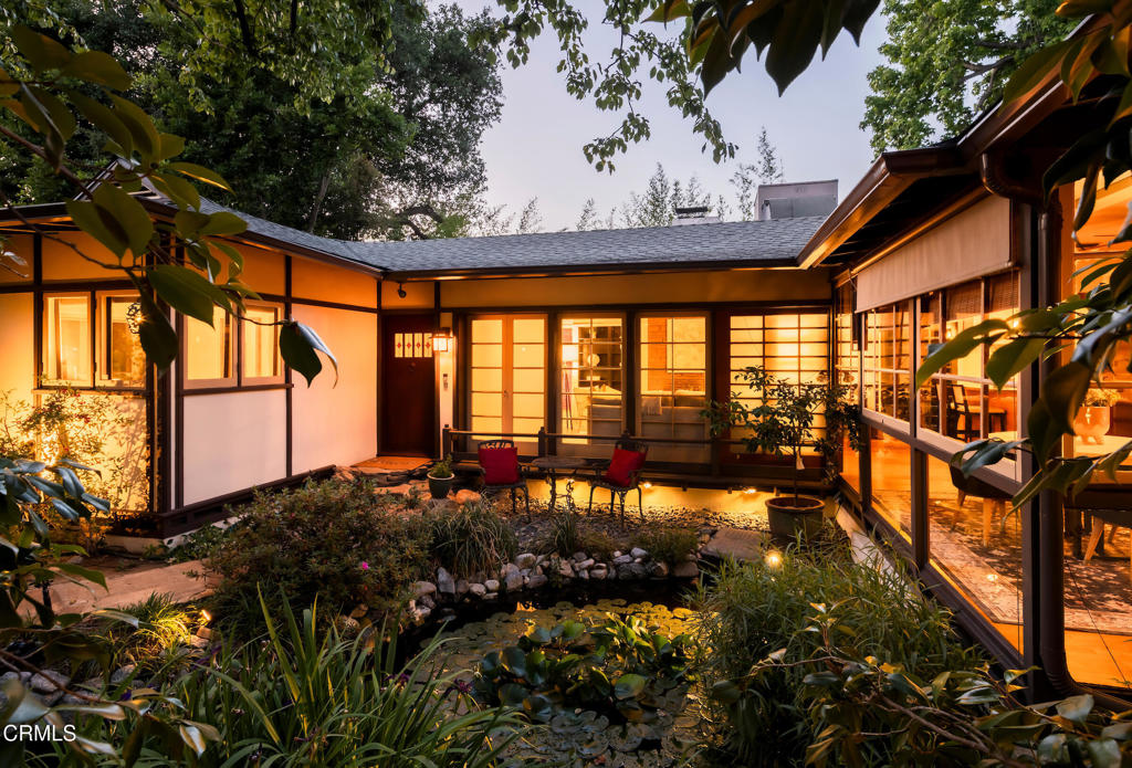 a view of swimming pool with a patio
