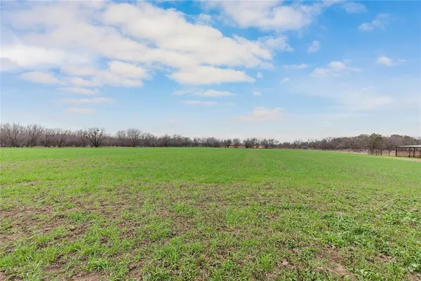 a view of a lake from a yard