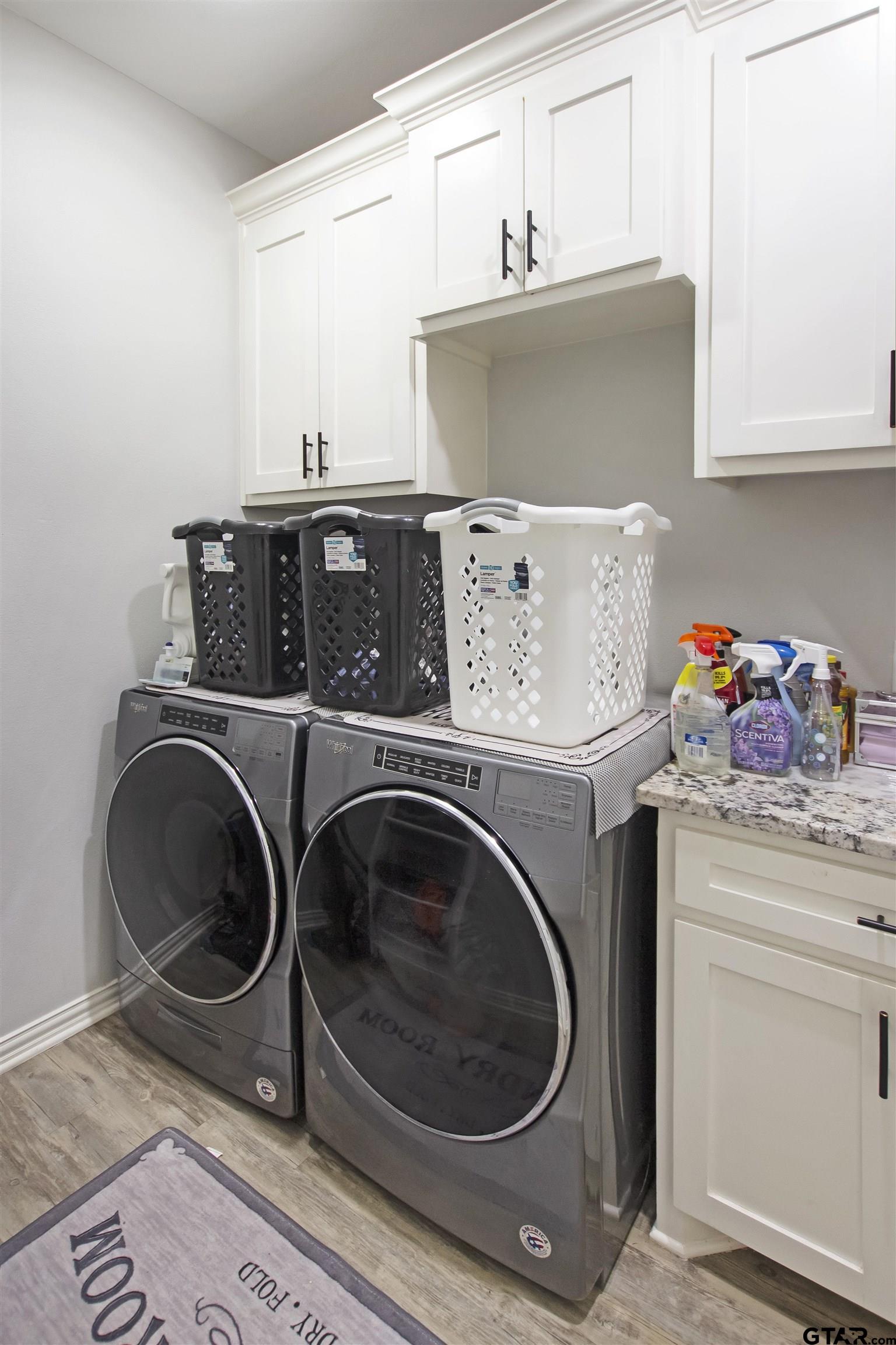 344 Duke Place Tyler, TX 75704 - Photo 14 of 36 a utility room with dryer and washer