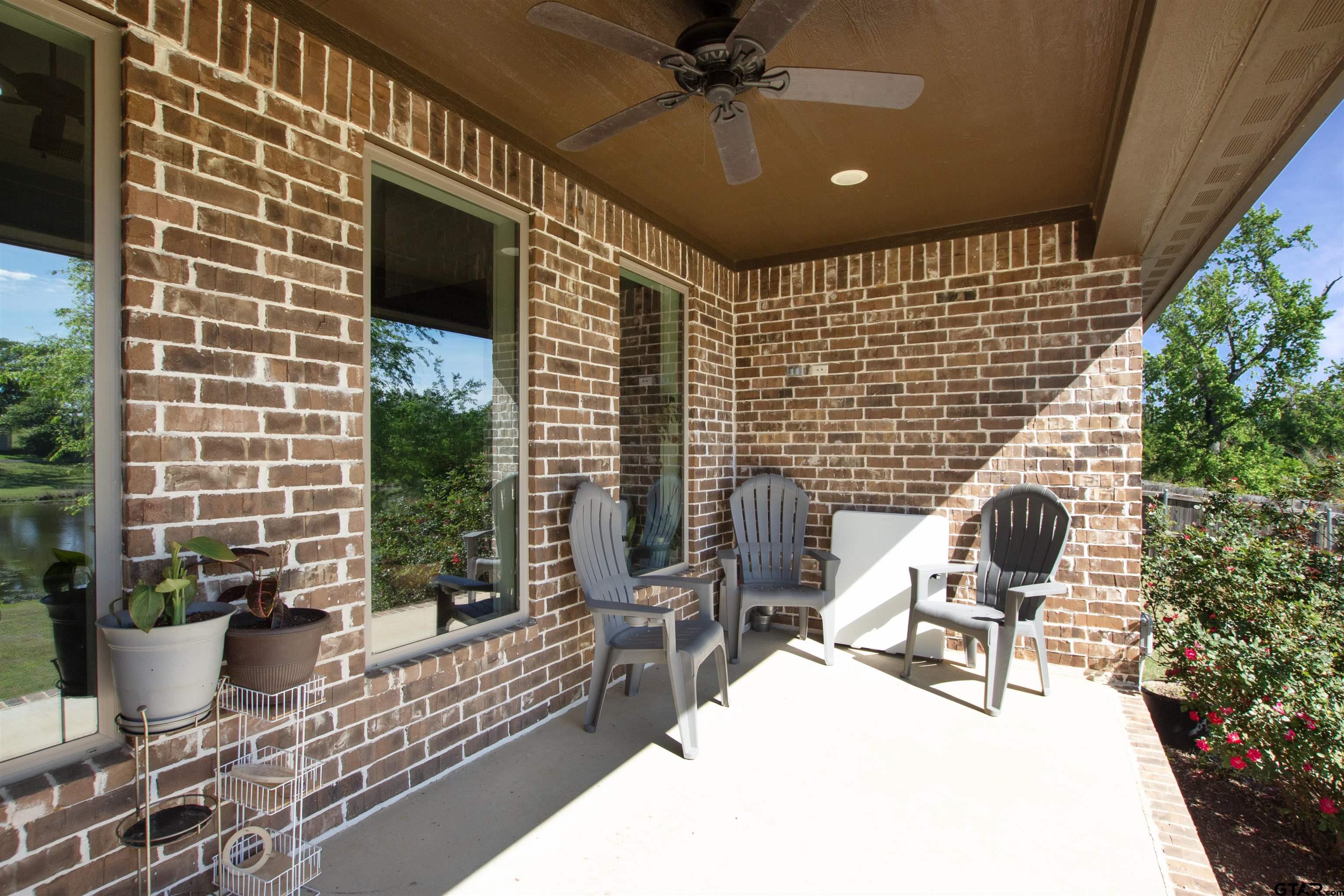 344 Duke Place Tyler, TX 75704 - Photo 29 of 36 a building outdoor space with patio furniture and potted plants