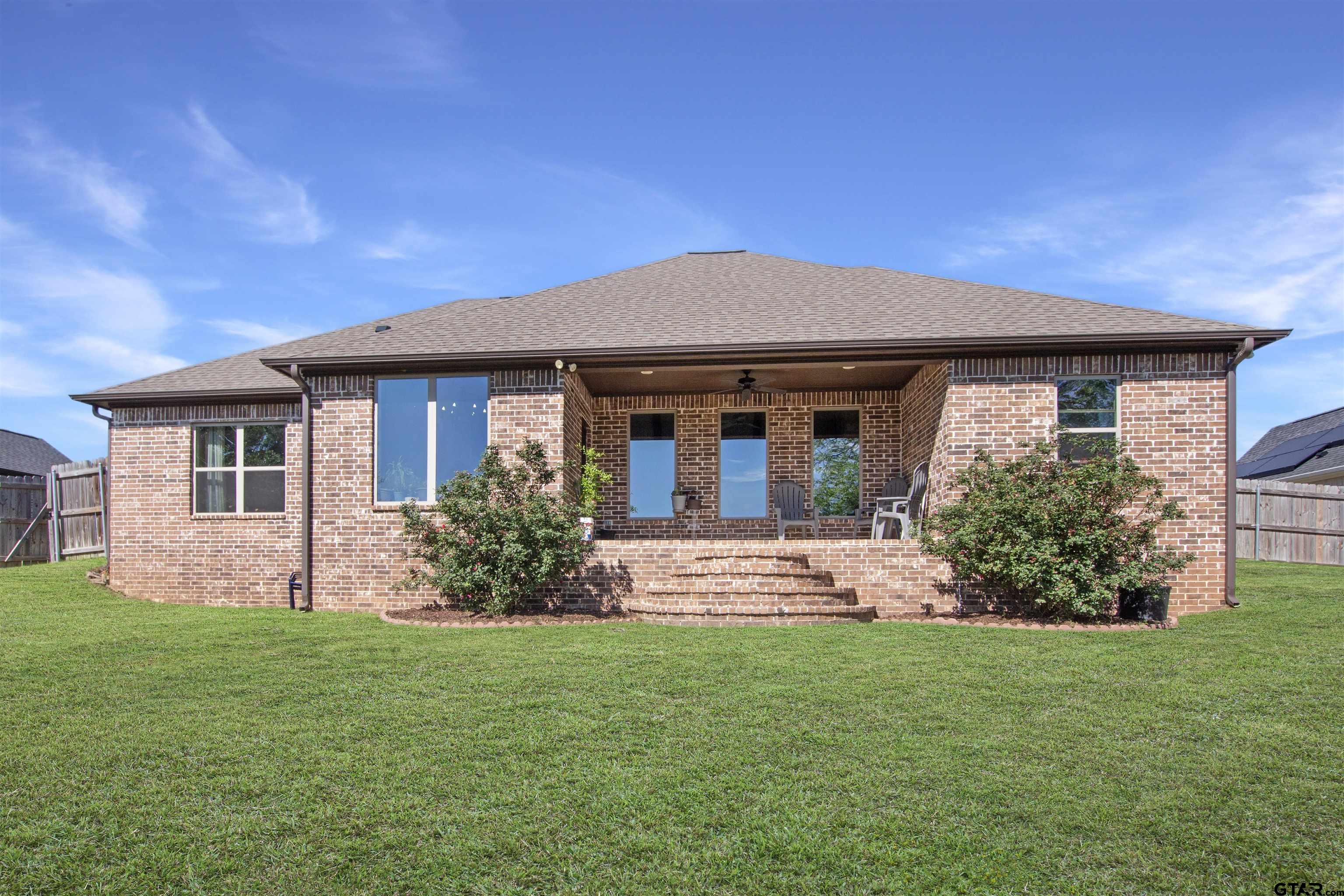 344 Duke Place Tyler, TX 75704 - Photo 31 of 36 a front view of house with yard and green space