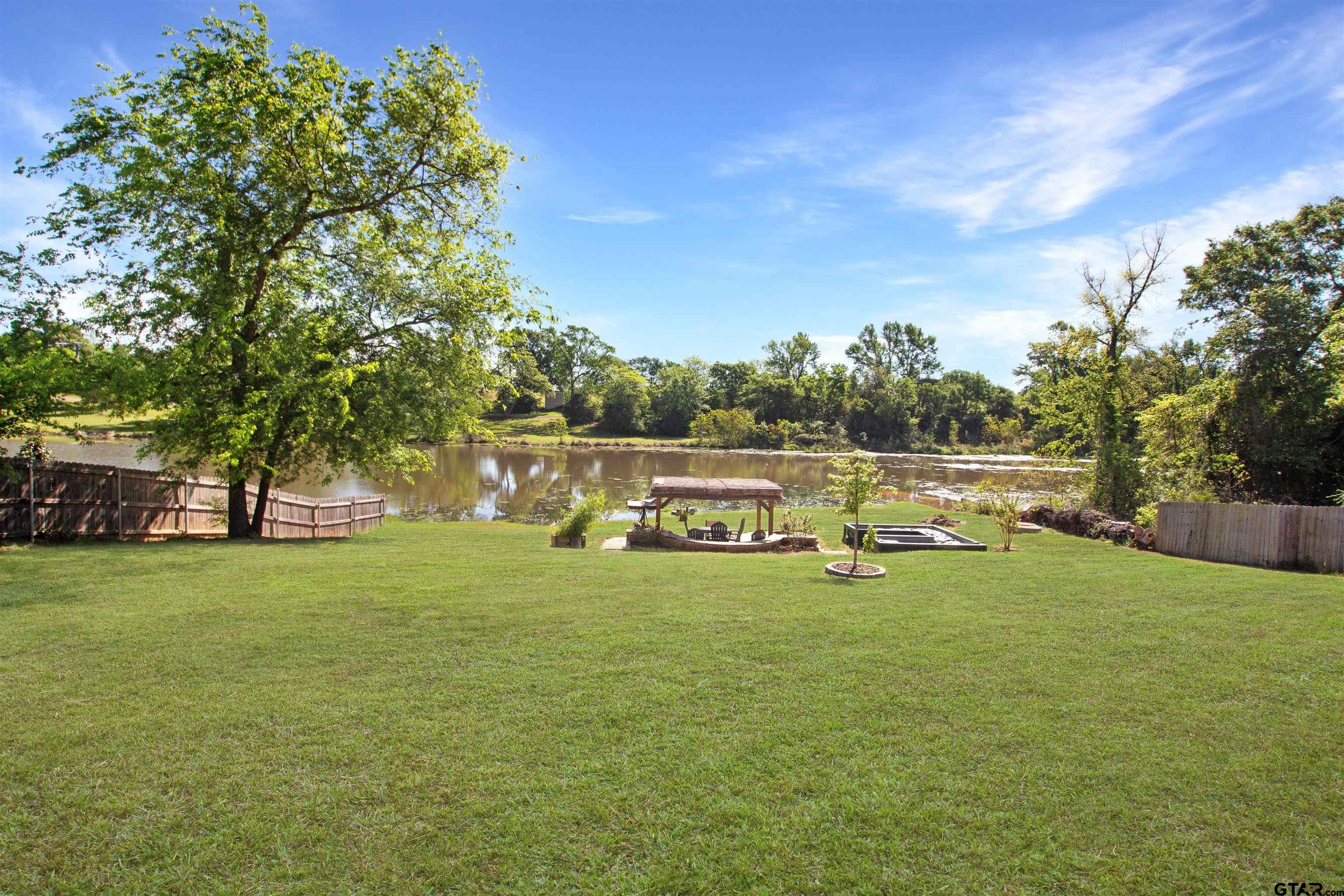 344 Duke Place Tyler, TX 75704 - Photo 35 of 36 a view of a house with a yard