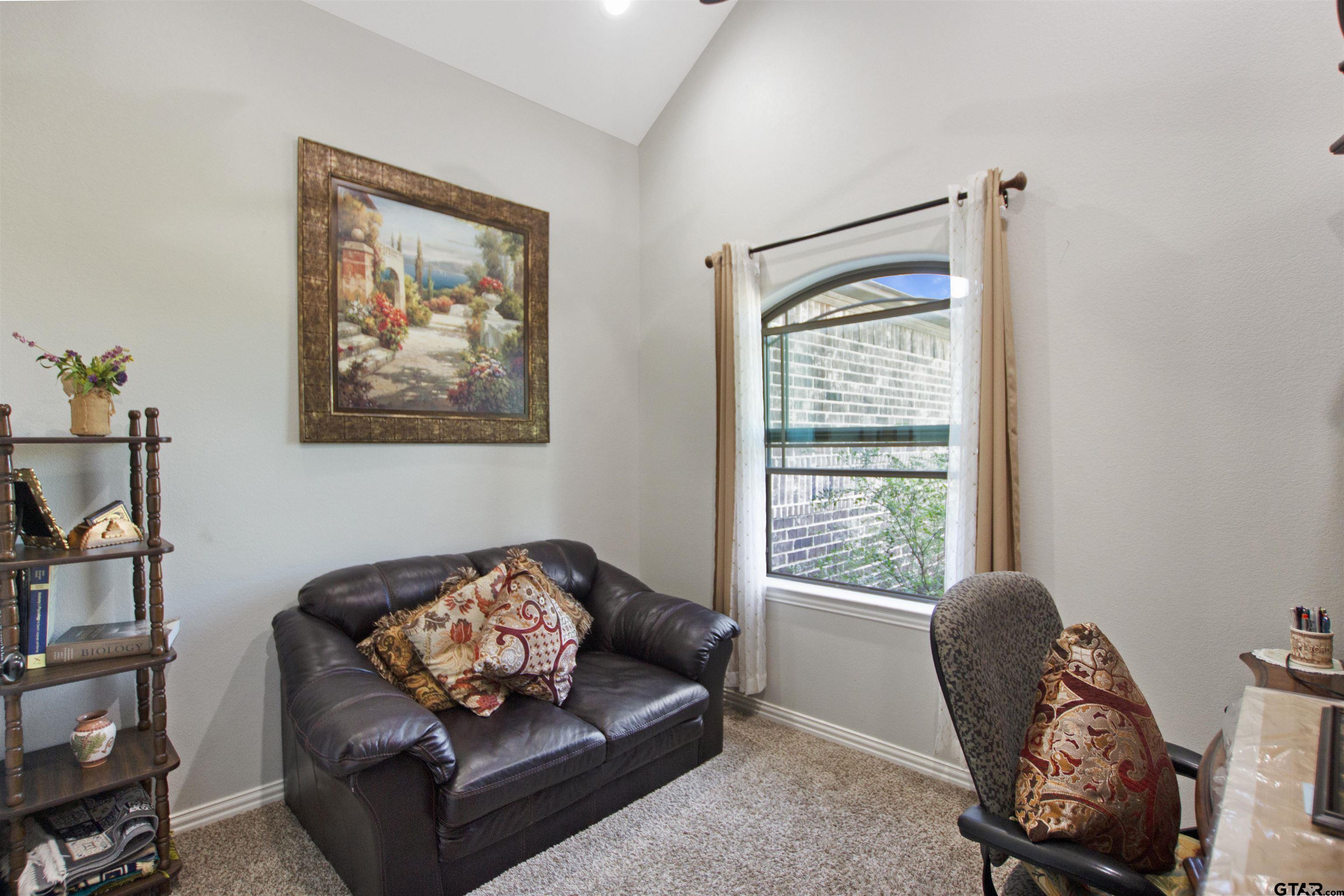 344 Duke Place Tyler, TX 75704 - Photo 4 of 36 a living room with furniture and a window