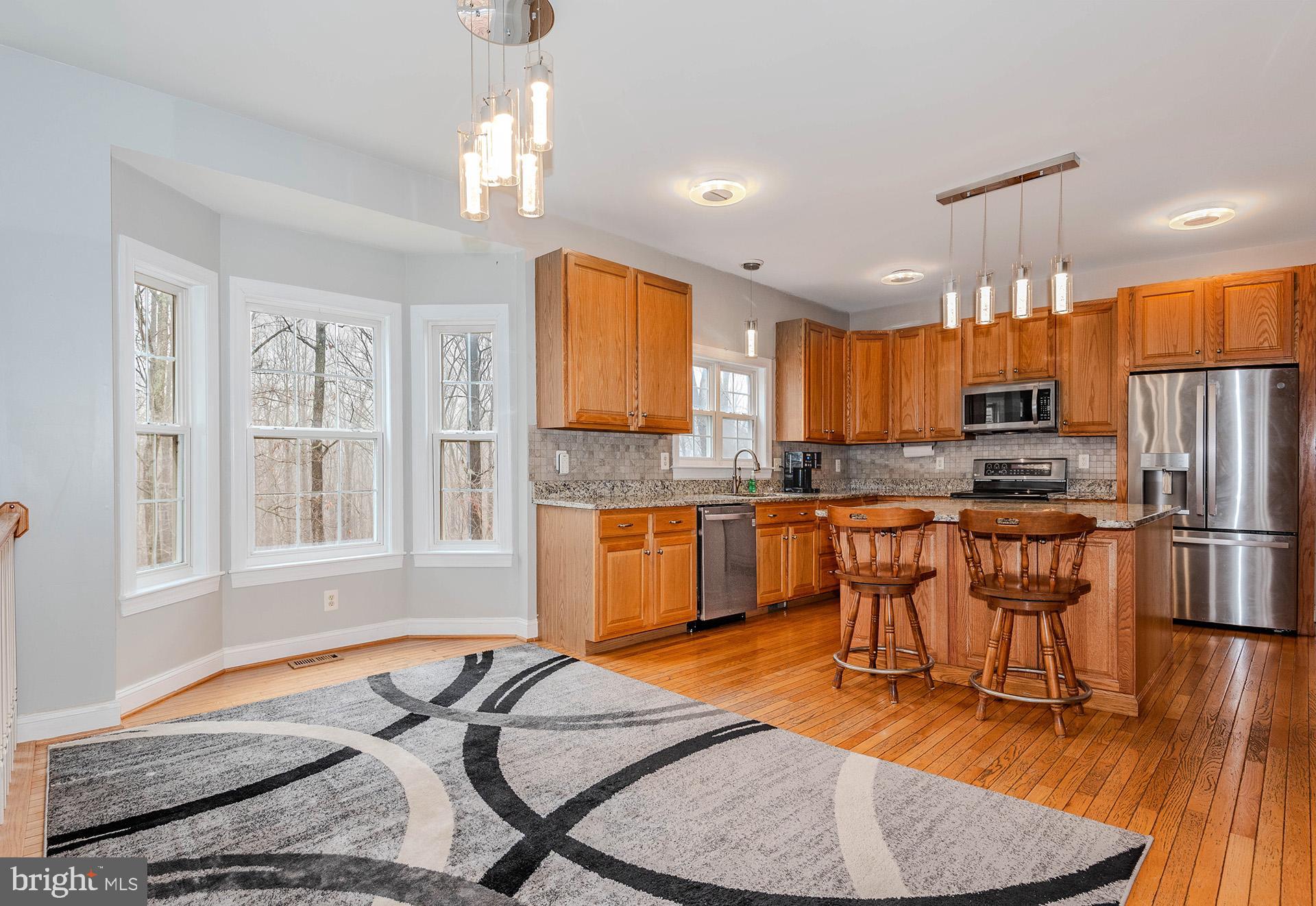 3895 Buffalo Road New Windsor, MD 21776 - Photo 18 of 44 Did you see those pendant lights- so pretty!