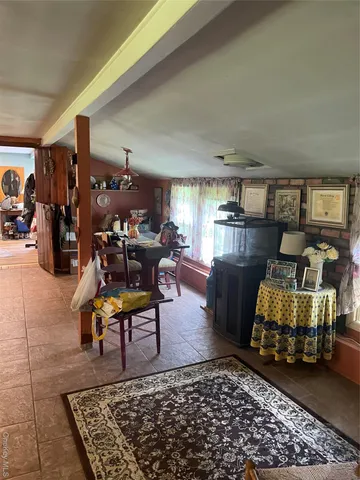 a kitchen with stainless steel appliances granite countertop a stove and a refrigerator