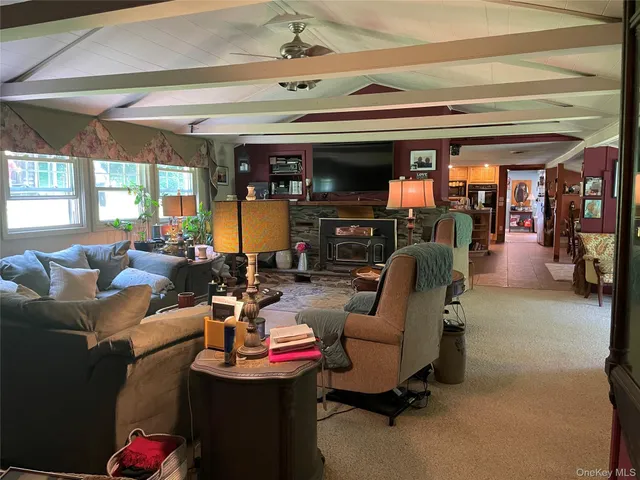 a dining room with furniture and window