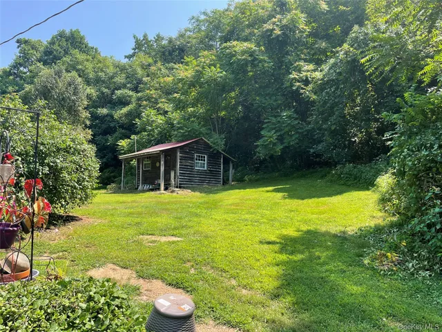 a kitchen with a sink and a stove top oven
