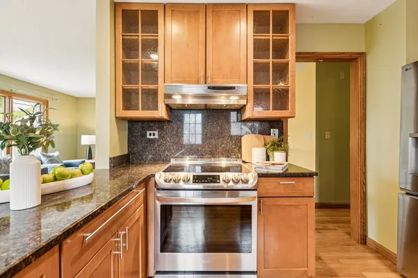 a kitchen with a stove and a sink